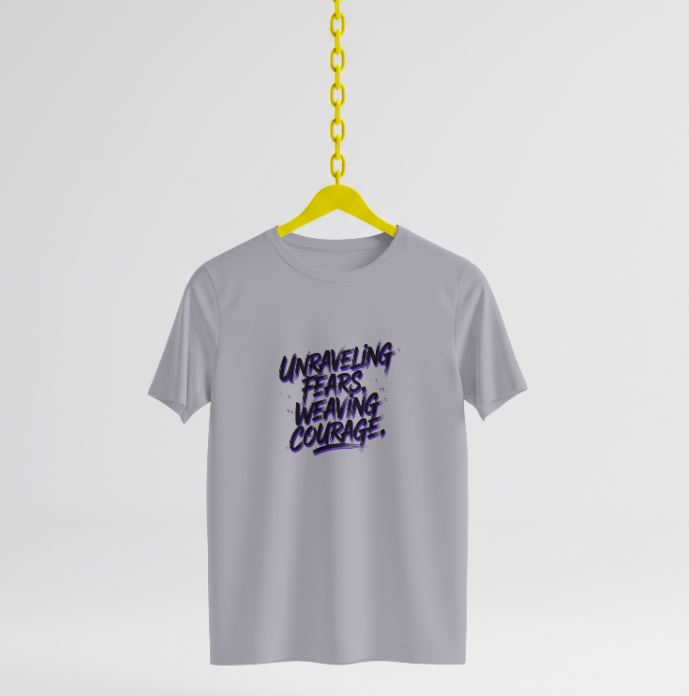 Soft, comfortable organic cotton tee with "Unraveling Fears, Weaving Courage" message. Eco-friendly, stylish, and made to empower your inner strength.