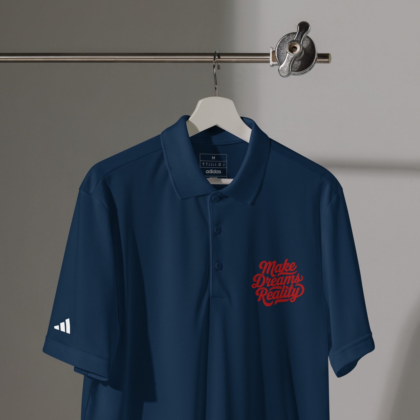 Stay cool and stylish with this adidas sport polo: 100% recycled polyester, moisture-wicking, relaxed fit. Perfect for active or casual wear.