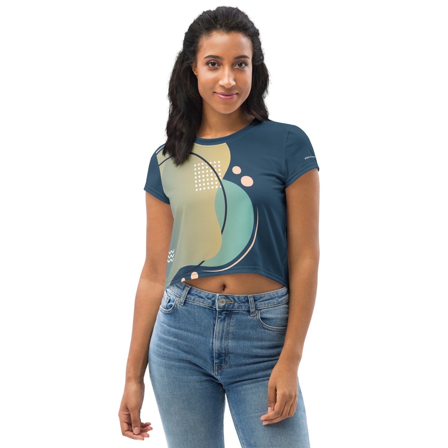 This everyday crop top features a vibrant abstract design (teal, mustard, peach) with a navy neckline. Stretchy and comfortable for effortless style.