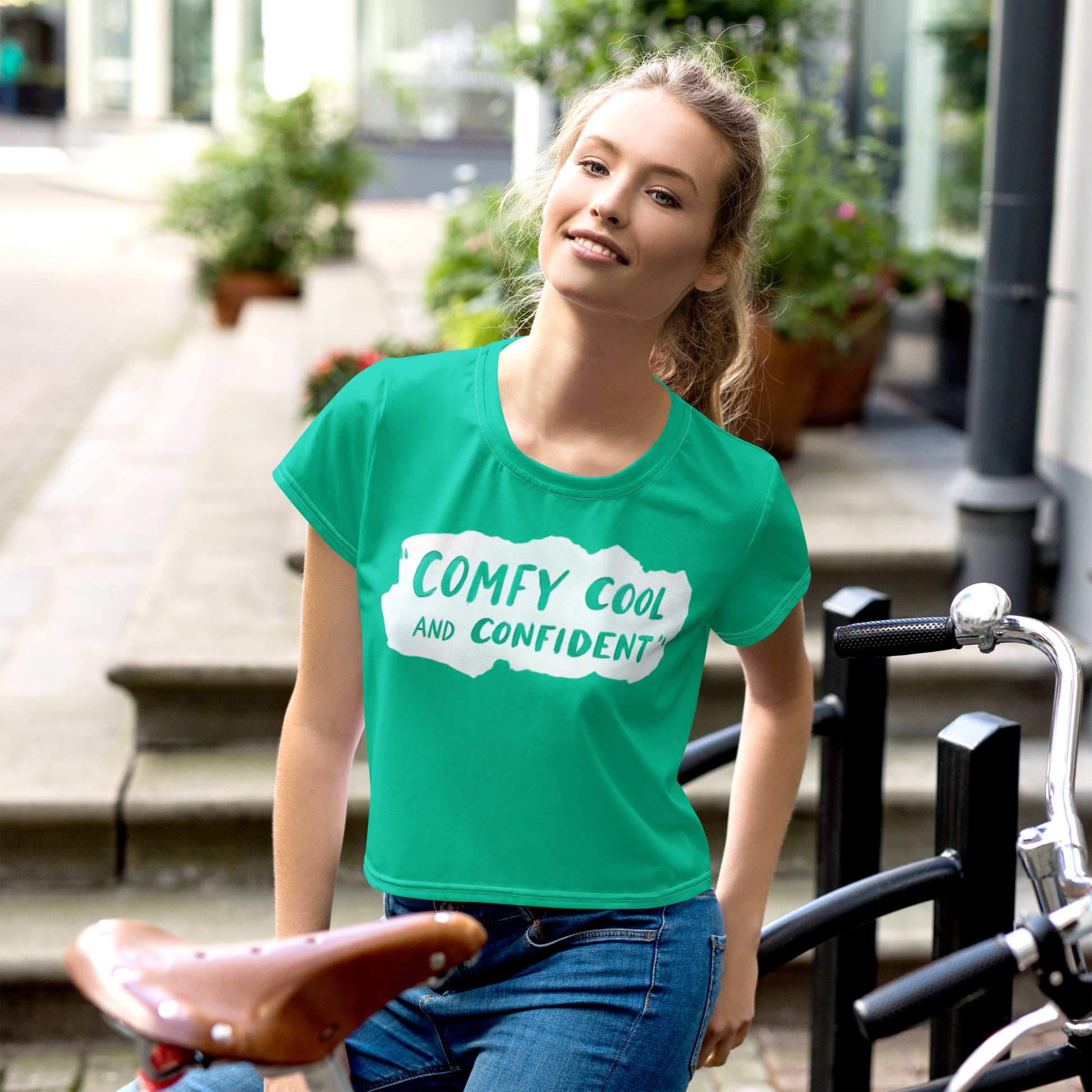 This trendy crop top is super comfy and cool, featuring "COMFY COOL AND CONFIDENT" on vibrant teal. Made from premium stretchy knit.