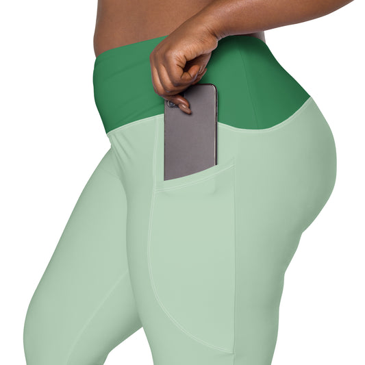 These Green Serenity Leggings offer comfort and style with mint and deep green hues. Made from recycled polyester, they're high-waisted, butt-lifting, and feature side pockets for all-day peace.